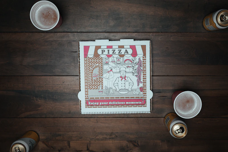 Red and white branded pizza box