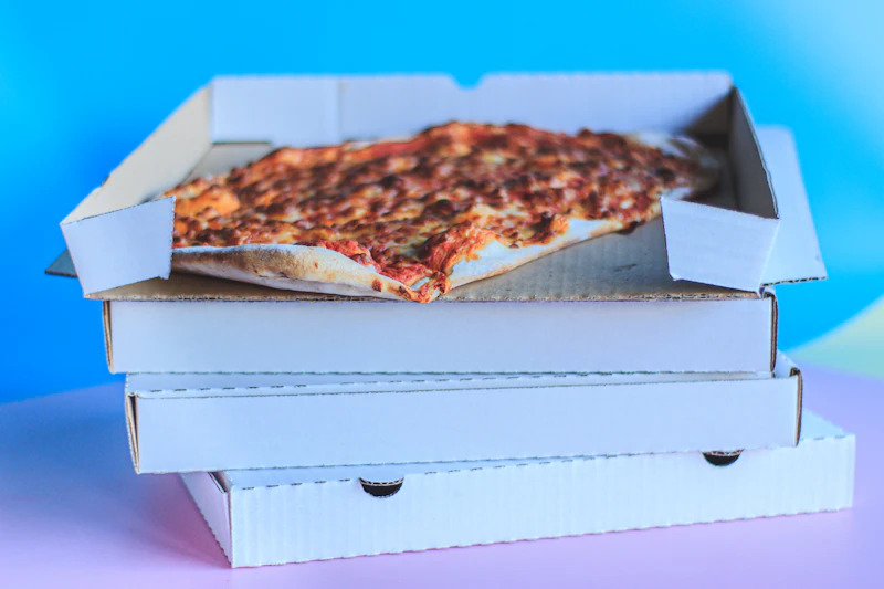 Pizza on a plain white printed box